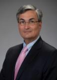 Dr. Derek Raghavan