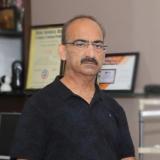 Dr. Harinder Mitra
