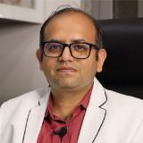 Dr. Kartik Purohit