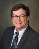 Dr. John N Caviness