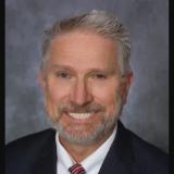 Dr. Rhett J Eckmann