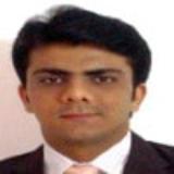 Dr. Kartik D Dholakia