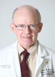 Dr. James M May