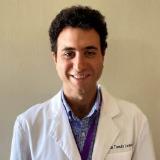 Dr. Jose Tomas Larach K