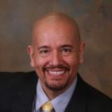 Dr. Simon Lucio