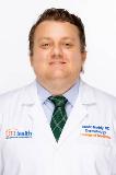 Dr. Austin J Maddy